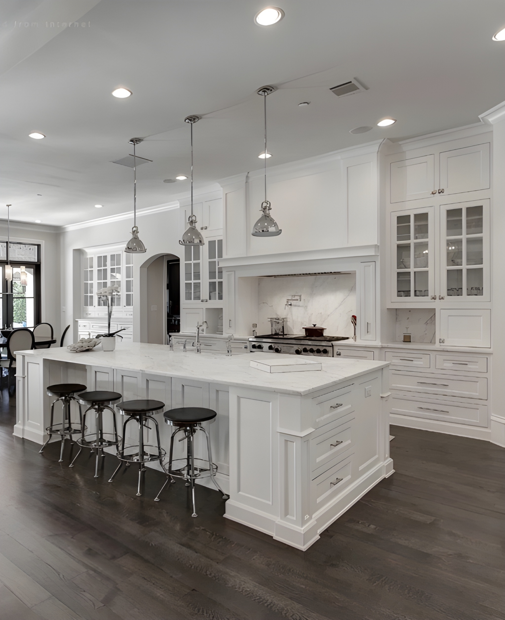 Elegant kitchen featuring marble countertops